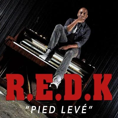 R.E.D.K. Pied levé